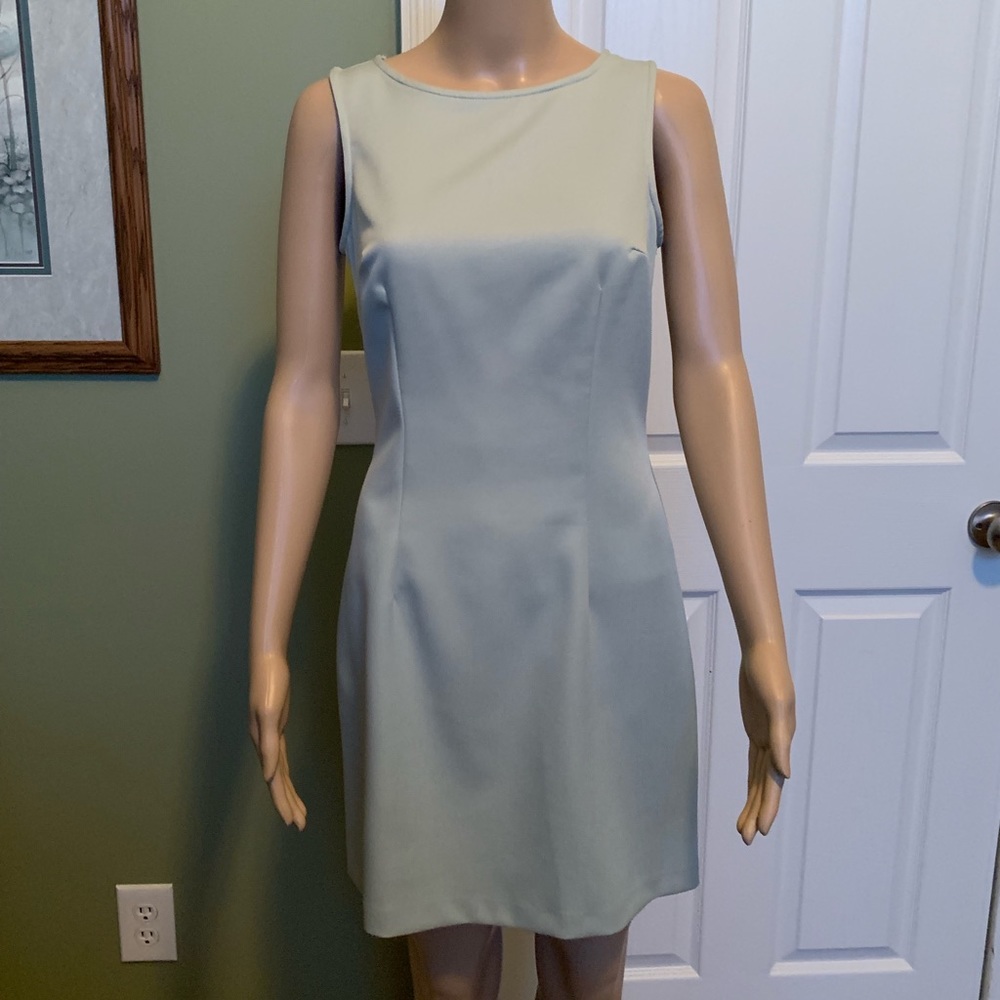 Light green sleeveless dress with matching jacket